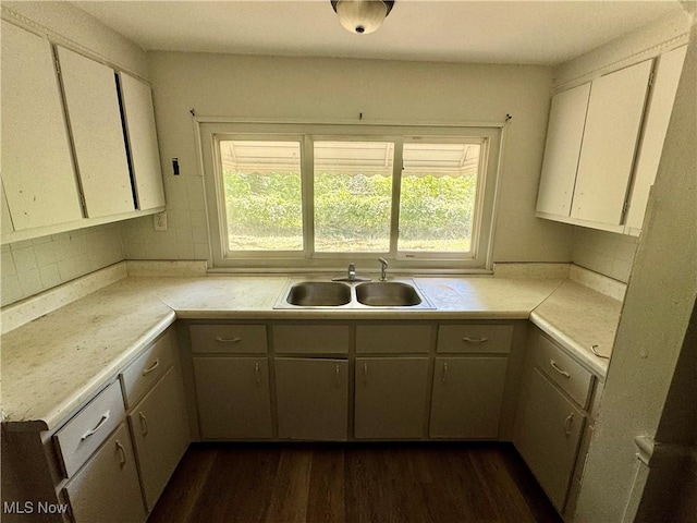 348 Jewell Dr, Akron, OH 44311 - kitchen with light countertops, dark wood-style floors, and white cabinets