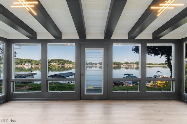 3350 S Main St, Akron, OH 44319 - doorway to outside with beam ceiling, a water view, wood finished floors, and healthy amount of natural light
