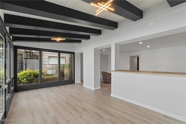 3350 S Main St, Akron, OH 44319 - spare room featuring beam ceiling and wood finished floors