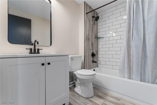 3350 S Main St, Akron, OH 44319 - full bath with shower / bath combo with shower curtain, vanity, and wood finished floors