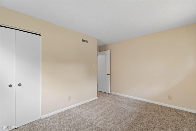 3139 Prior Dr, Cuyahoga Falls, OH 44223 - unfurnished bedroom with light colored carpet and a closet