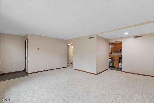3139 Prior Dr, Cuyahoga Falls, OH 44223 - unfurnished living room with light colored carpet and baseboards
