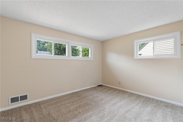 3139 Prior Dr, Cuyahoga Falls, OH 44223 - empty room featuring carpet floors and a textured ceiling