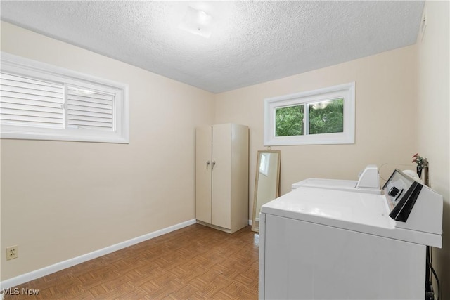 3139 Prior Dr, Cuyahoga Falls, OH 44223 - washroom with separate washer and dryer and a textured ceiling