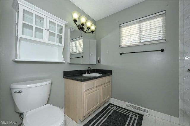 8714 Quailridge Ct, Macedonia, OH 44056 - bathroom featuring vanity, healthy amount of natural light, and tile patterned floors