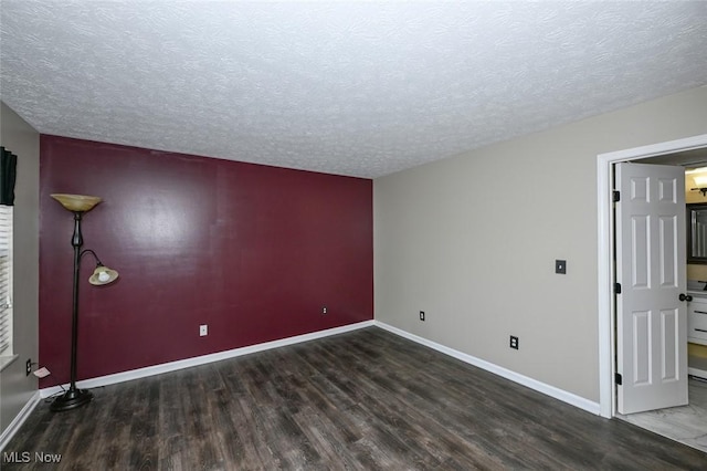 8714 Quailridge Ct, Macedonia, OH 44056 - unfurnished room featuring wood finished floors and a textured ceiling