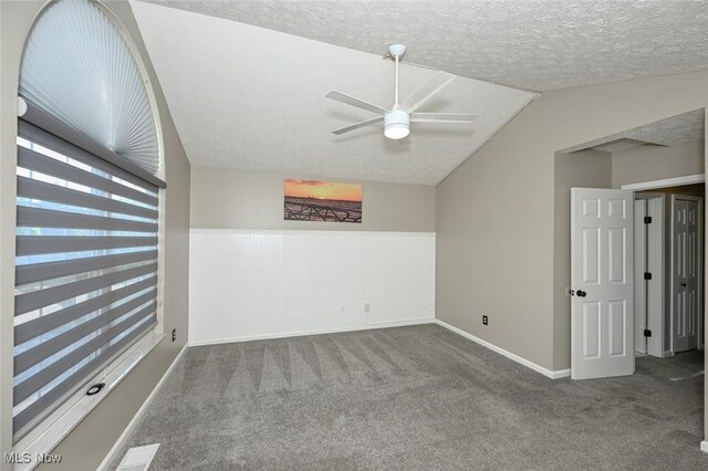 8714 Quailridge Ct, Macedonia, OH 44056 - carpeted empty room with a ceiling fan and lofted ceiling