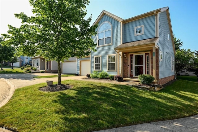 8714 Quailridge Ct, Macedonia, OH 44056 - view of front of property with concrete driveway, a garage, and a front lawn