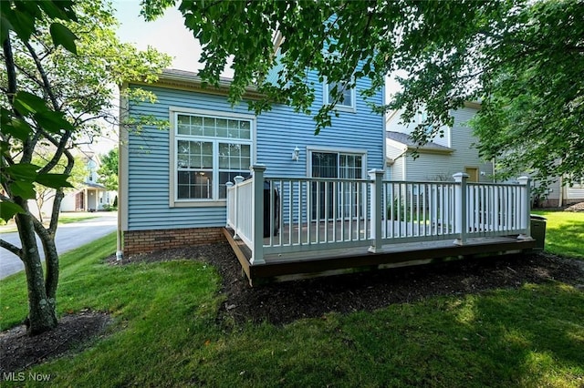 8714 Quailridge Ct, Macedonia, OH 44056 - back of property with a wooden deck and a yard