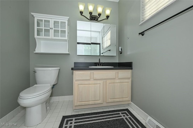 8714 Quailridge Ct, Macedonia, OH 44056 - bathroom with a chandelier, vanity, and tile patterned floors