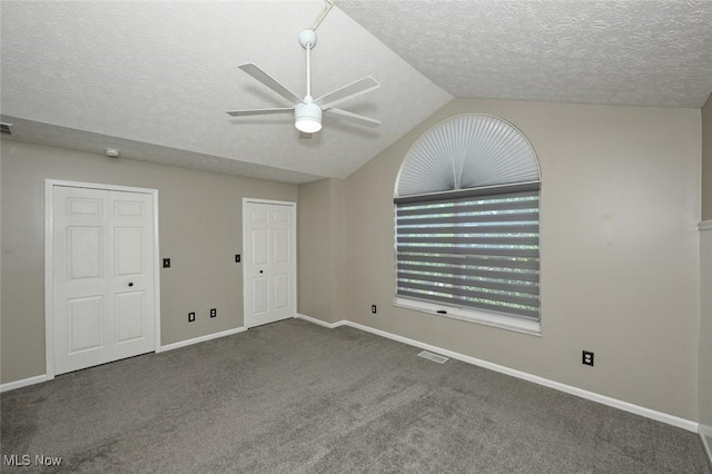 8714 Quailridge Ct, Macedonia, OH 44056 - spare room featuring ceiling fan, vaulted ceiling, a textured ceiling, and carpet flooring