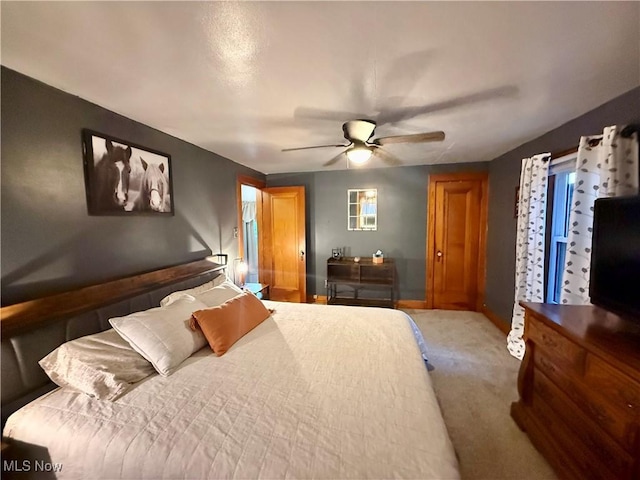 1257 Elmhurst Dr, Weirton, WV 26062 - carpeted bedroom featuring baseboards and ceiling fan