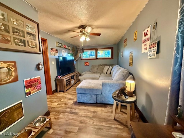 1257 Elmhurst Dr, Weirton, WV 26062 - living area with a ceiling fan, a textured ceiling, and wood finished floors