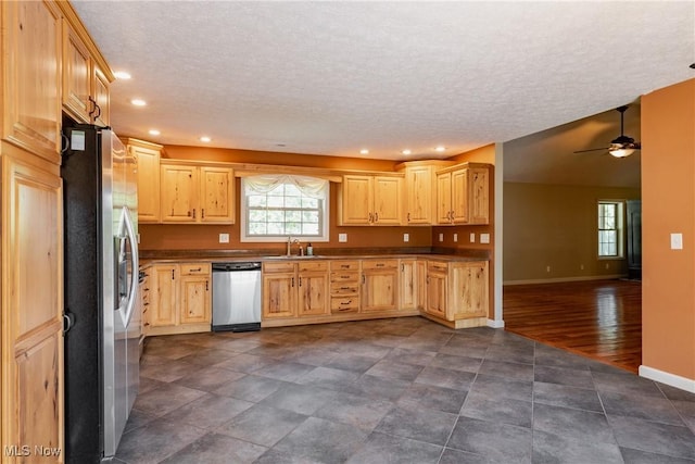 200 Breezy Acres Ln, Walker, WV 26180 - kitchen with stainless steel appliances, a textured ceiling, light brown cabinets, recessed lighting, and a ceiling fan