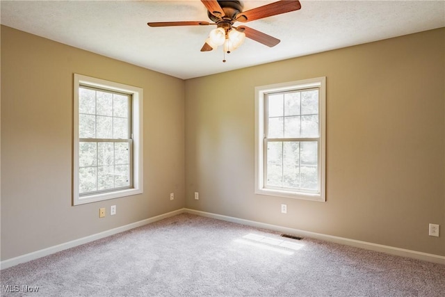 200 Breezy Acres Ln, Walker, WV 26180 - carpeted spare room featuring baseboards and ceiling fan