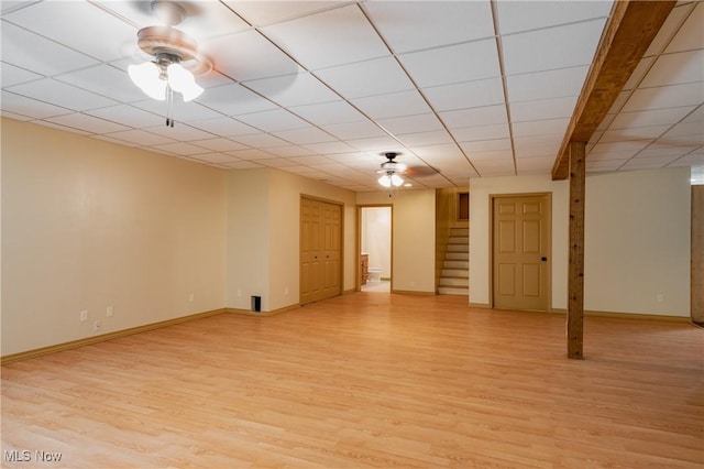 200 Breezy Acres Ln, Walker, WV 26180 - finished below grade area with light wood-type flooring, a ceiling fan, and stairs