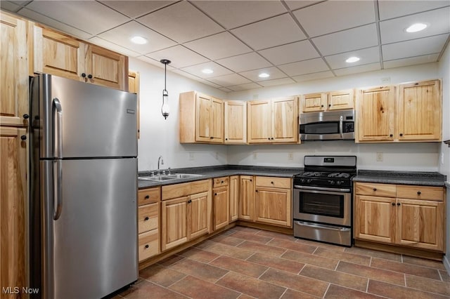 200 Breezy Acres Ln, Walker, WV 26180 - kitchen featuring appliances with stainless steel finishes, dark countertops, recessed lighting, light brown cabinetry, and a drop ceiling