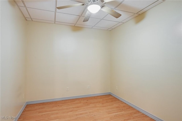 200 Breezy Acres Ln, Walker, WV 26180 - spare room with a paneled ceiling, light wood-style floors, and a ceiling fan
