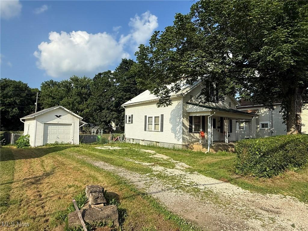 921 Trenton Ave, Uhrichsville, OH 44683 - photo 1