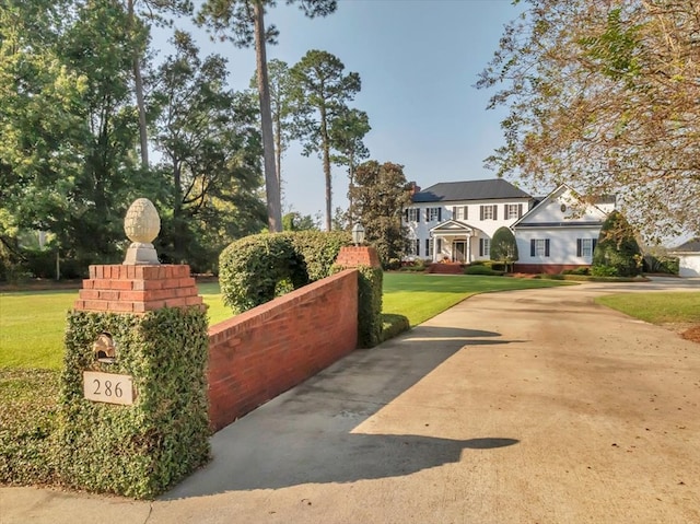 exterior space with a front lawn