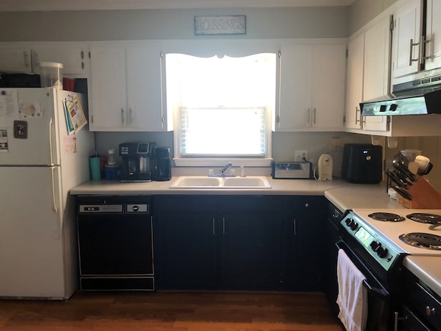 2814 Reeves Ln, Albany, GA 31721 - kitchen with black appliances, under cabinet range hood, and light countertops