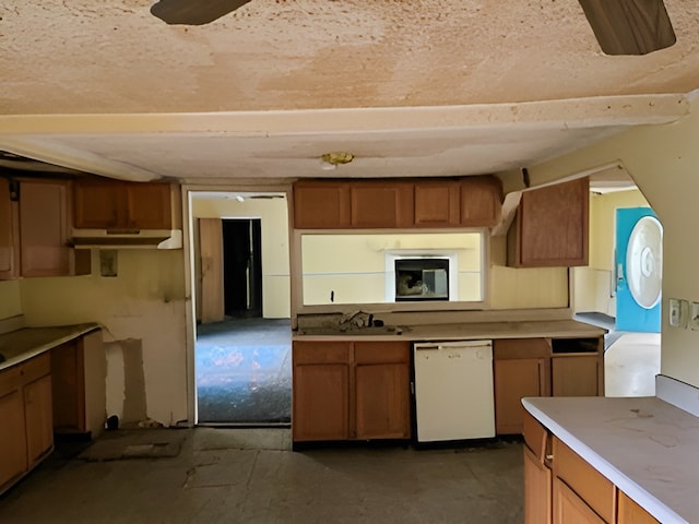 kitchen featuring sink, ceiling fan, and white dishwasher