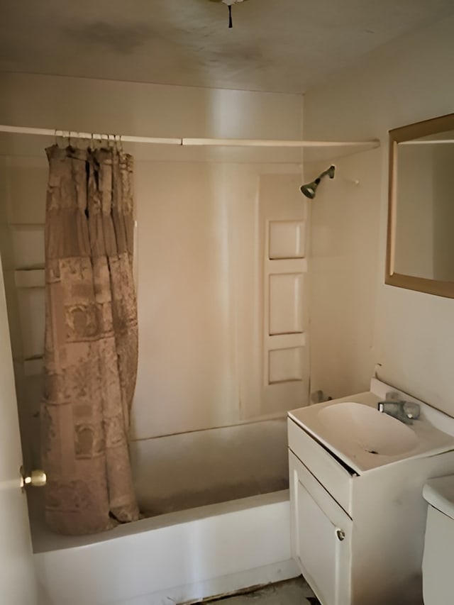 full bathroom with vanity, toilet, and shower / bath combination with curtain