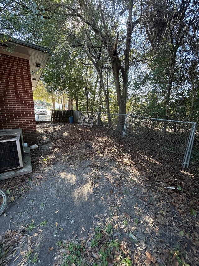 view of yard featuring cooling unit