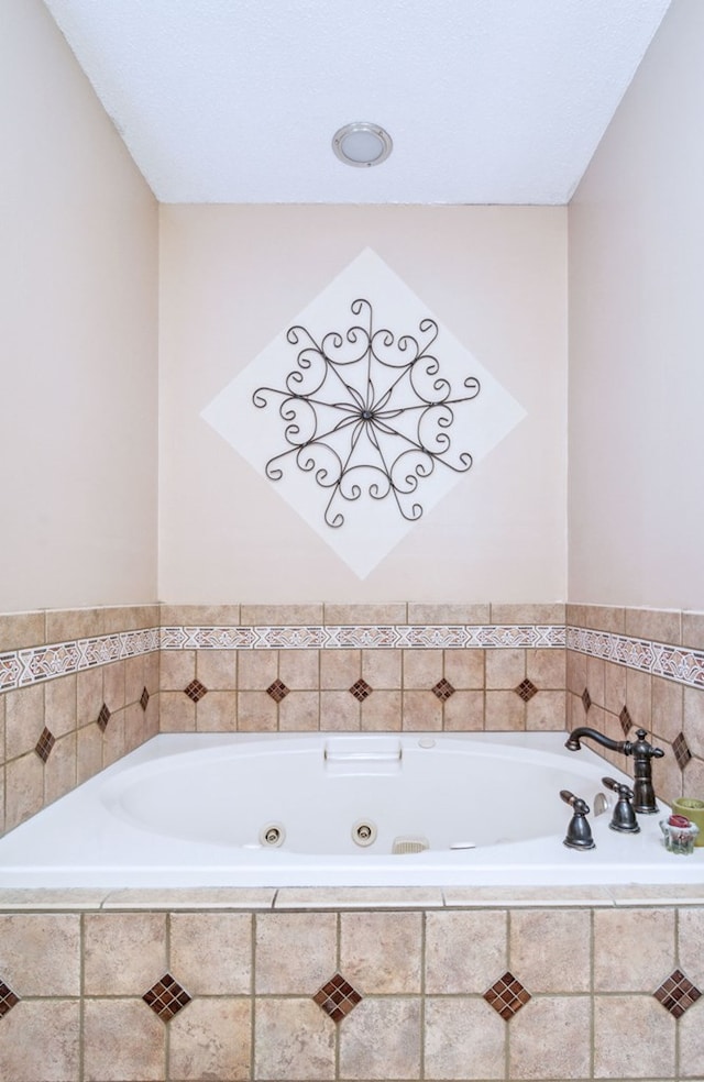 bathroom featuring a relaxing tiled tub