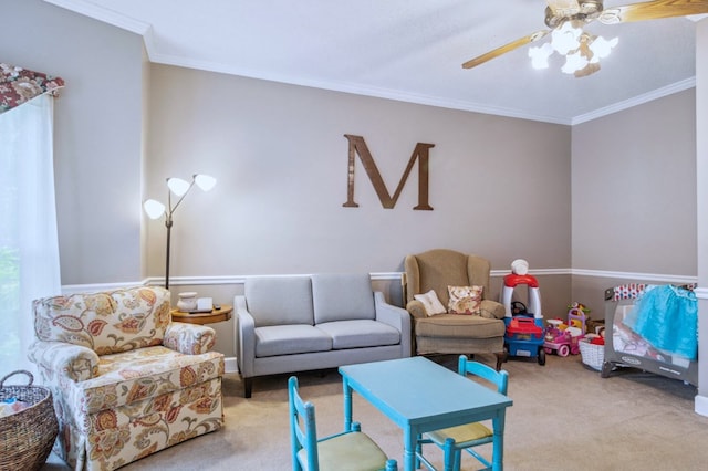 carpeted living room featuring ceiling fan and crown molding