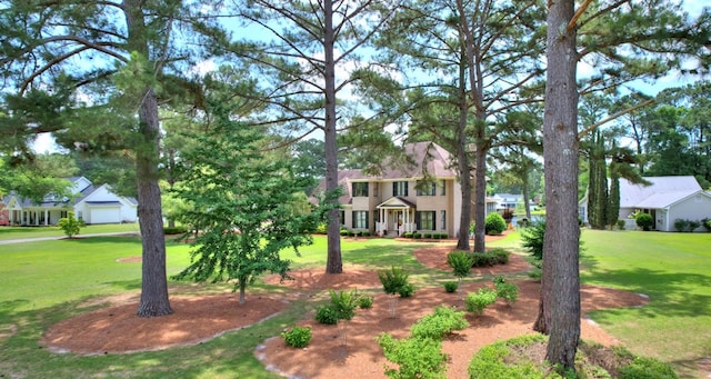 view of front of home with a front yard