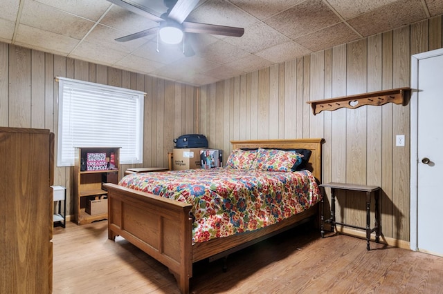 272 Ellis Rd, Plains, GA 31780 - bedroom with a ceiling fan, wood finished floors, and a paneled ceiling