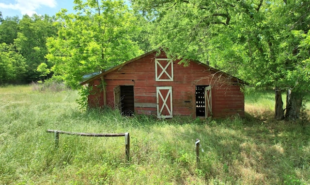 272 Ellis Rd, Plains, GA 31780 - view of barn featuring a view of trees