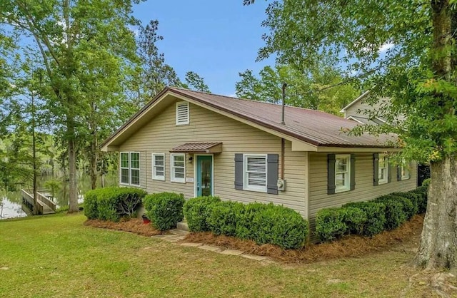 ranch-style house with a front yard