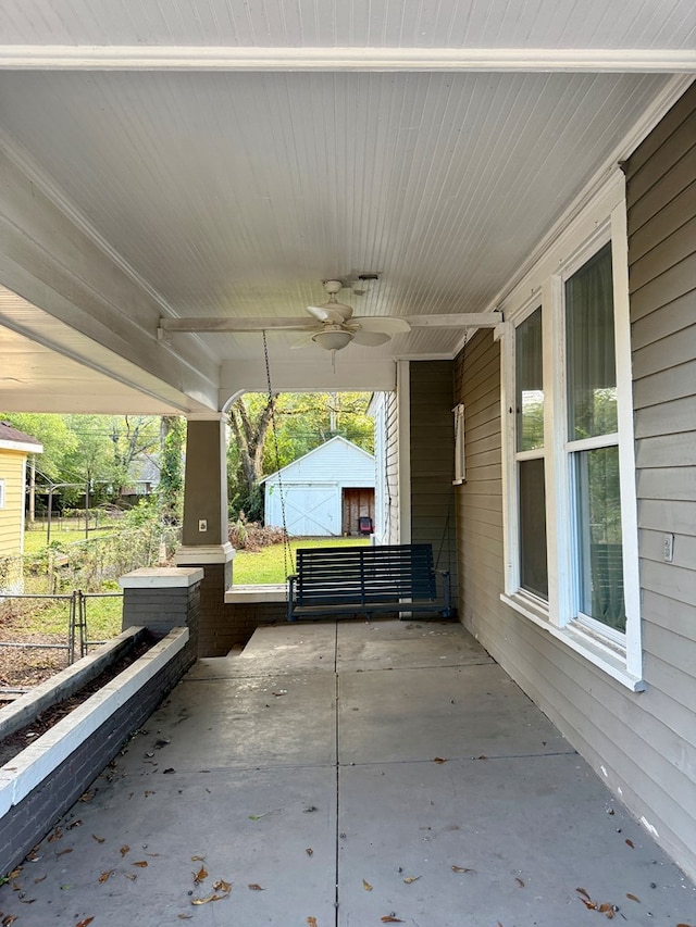 view of patio featuring ceiling fan