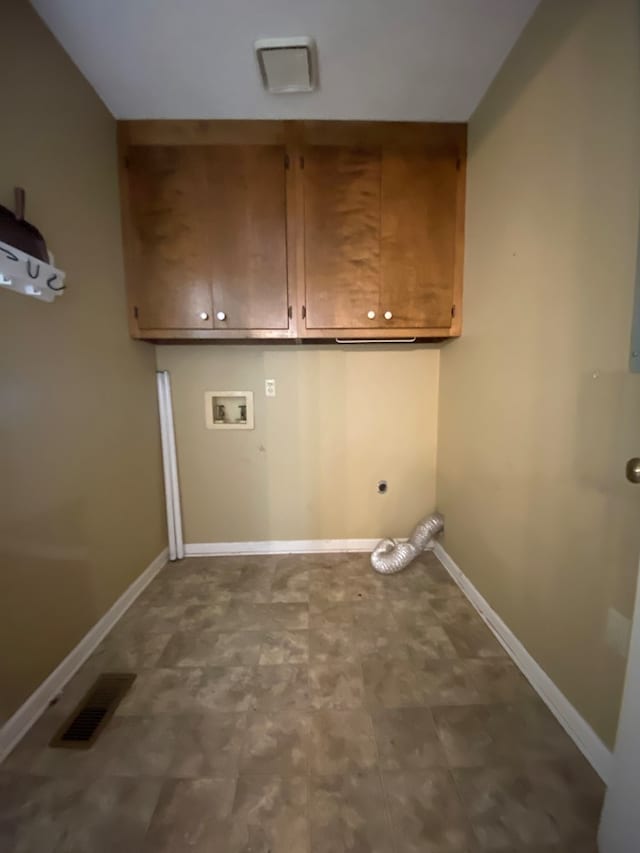 washroom with cabinets, washer hookup, and electric dryer hookup