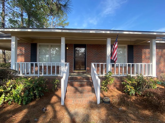 view of front of house with covered porch