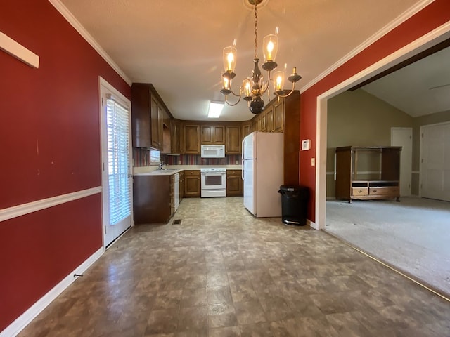 kitchen featuring pendant lighting, a notable chandelier, white appliances, and ornamental molding