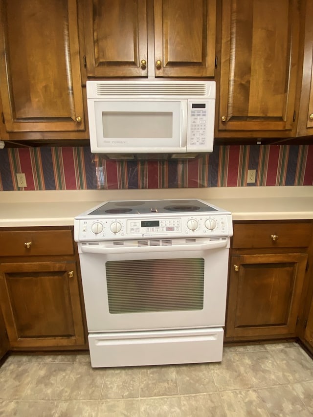 kitchen featuring white appliances