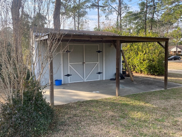 view of outdoor structure with a lawn