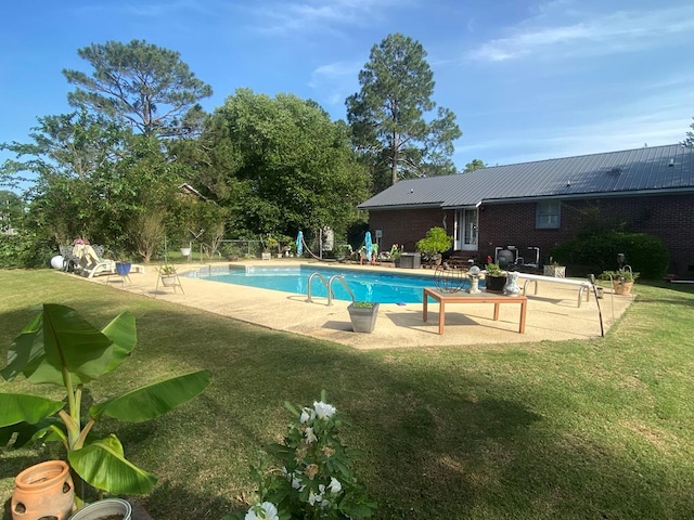 615 E 28th Ave, Cordele, GA 31015 - swimming pool with a patio area and a yard