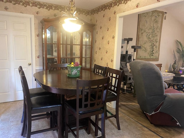 615 E 28th Ave, Cordele, GA 31015 - dining area featuring wallpapered walls and wood finished floors