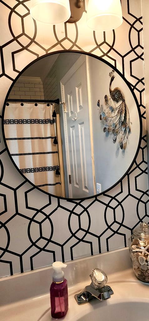 room details with backsplash and a sink