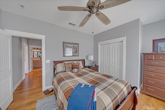 bedroom featuring a closet, ceiling fan, and light wood-type flooring