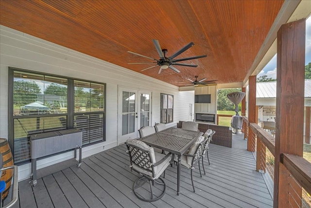 wooden deck with ceiling fan