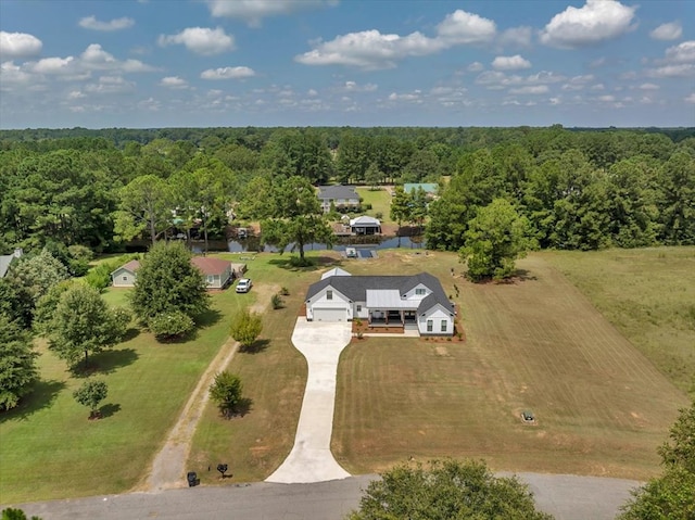 birds eye view of property featuring a rural view