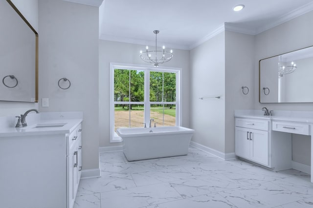 bathroom with vanity, a notable chandelier, a bathtub, and ornamental molding