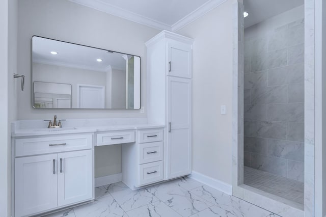 bathroom featuring crown molding, tiled shower, and vanity