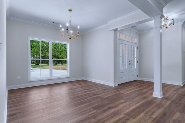 unfurnished dining area with dark hardwood / wood-style flooring, an inviting chandelier, and french doors