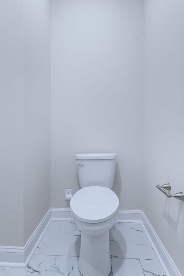 bathroom featuring toilet